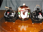 Vintage Japan shakers and sugar bowl. 3 items, one price! This is a pair of fat little tea kettles with wire bail handles, and has a rooster motif on the frontside! These have the cork stoppers and re...