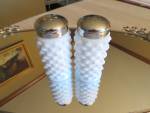Attractive vintage milk glass shakers. Nice pair of shakers. Very little evidence of age/wear. They are nice to use at a formal dinner party; Easter, X-mas, etc. They stand almost 3.5 tall. No mark so...
