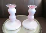 Fenton Peachcrest candleholders. Very lovely early Fenton candleholders. The have no chips or cracks and are 3.75 wide across the bottom x 5 inches tall. Pink interiors. Great to use or display or add...