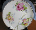 Hand painted, artist signed rose plate. Artist signature on a stem in pic #4 but I cannot make out what it reads. The back has a green backstamp: Jon Roth Studios, Hand Painted, and looks like Bavaria...
