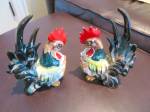 Vintage rooster pair. Both have fragments of old paper 'Japan' labels on bottoms. Both are 6 inches tall x 4 inches long. Both have small bits of the red cold paint missing from their crops but are no...