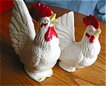 Vintage Japan rooster and hen figurine. These have a Japan paper label on bottoms. Rooster is 7 tall x 5 wide from side view. Hen is a bit smaller. No chips or cracks, just a bit of wear around beaks....