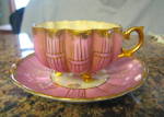 Lustre footed Royal Sealy teacup. Gorgeous melon shaped teacup. Royal Sealy backstamp on saucer. Cup is 3.5 wide; saucer is 5.5 wide. The perfect gift! This teacup is shown in the book on teacups I be...
