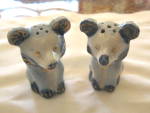 Vintage Japan animal shakers. Bears? Gold trimmed; very cute with cork stoppers. They stand 2.75 tall. One has a tiny scratch or glaze separation line near one of the holes on the top of the head; not...