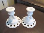 Vintage Westmoreland Milk Glass Candleholders. c: 1940's-82 mark. No chips or cracks; both have the Westmoreland logo on the their bottoms. They stand 4.75 tall x 4.5 wide across the bottom. Very pret...