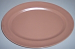 This is an offering for a pristine Franciscan Pottery El Patio satin coral 13" by 10" platter! Round Franciscan Ware ink mark. Not a hint of use and has no nicks, chips, cracks or repairs. S...