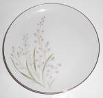 This is an offering for a pristine  Fine China of Japan 7-1/2" wide salad plate in the lovely Eden Pink Floral with platinum band pattern.  EDEN ink mark.  Not a hint of use and has no nicks, chi...