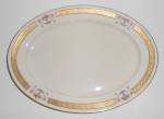 This is an offering for a gorgeous 12" by 8-3/4" platter in a pink roses and swags with gold encrusted band pattern from the Heinrich company.<BR><BR>If anyone knows the name of this pattern...