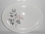 This is an offering for a Sabin China 13-3/8" by 10-1/4" platter in a lovely dainty pink floral pattern.<BR><BR>Gold Sabin China oven proof made in U.S.A. mark. <BR><BR>There is only very li...