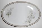 This is an offering for a Noritake China 14-1/4" by 9-1/2" platter in the lovely Michelle with gold bands pattern.<BR><BR>NORITAKE CHINA JAPAN 6021 MICHELLE U.S. DESIGN PAT. PEND. ink mark. ...