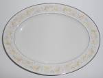 This is an offering for a Noritake China 13-5/8" by 10-3/8" platter in the lovely Blossom Time pattern.<BR><BR>Noritake Ivory China JAPAN 7150 BLOSSOM TIME ink mark. <BR><BR>May have light w...