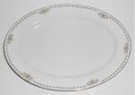 This is an offering for a gorgeous 11-3/4" by 8-1/2" platter in a green leaves pattern with gold band from the Heinrich company.<BR><BR>Marked 'H & Co SELB BAVARIA'.<BR><BR>Just a hint of we...