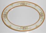 This is an offering for a Noritake China 13-3/4'' by 10-3/8'' platter in a lovely pink, blue, yellow floral pattern with gold trim. <BR><BR>NORITAKE M HAND PAINTED MADE IN JAPAN ink mark.  <BR><BR>Not...