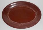 Fresh to the market after decades of sitting in storage, is an offering for a  rarely seen Vernon Kilns brown Heritage platter measuring 13-5/8" by 10".<BR><BR>Faint Vernon Kilns mark.<BR><B...