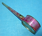 This vintage tin noise makeris in good contion.  The paint shows considerable wear (see pics)  There is a rattle in the drum end and a whistle on the other.  