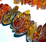 Baltic Amber 28 inch long large golden amber nugget beads graduated largest 7/8 of an inch smaller ones 1/4 inch lovely golden honey color with lots of 'bugs'.
