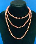 Rose Quartz Faceted Hand Knotted Beads Necklace 56 Inches 6.5mm Beads no clasp can be worn looped Rose Quartz Necklace. Beads were not knotted in recent times.