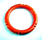 Bakelite Tangerine Carved Bangle Bracelet inner diameter 2 5/8 inches 3/8 of an inch wide.