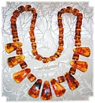 Baltic Golden Amber leaves and Bugs 96grams! Large handknotted Beads squared and Graduated with 9 long pendants. beads 3/8 at the smallest to 1/2 inch for the larger ones Pendants are 1 3/8 inches lon...