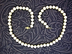 18 Inch handknotted 7mm Genuine Pearl necklace, with a 14K Gold clasp. The pearls are lovely on, and have a Beautiful lustre. There is a littled mark in a Box both sides on the clasp CP.