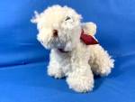 This little sheep is made from lamb skin and sports a ribbon 7 Inches. Lives in a smoke free home 