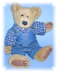 14 Inch bean Filled Tummy Boyds Bearwear Teddy Bear. He is in very good condition and lives in a smoke free home. He is dressed in Overalls with a blue and cream checkered shirt. His head swivells.