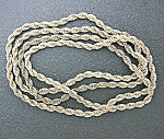  NO Clasp on this heavy rope necklace. It is 68.8 grams, and there is NO Mark anywhere that I can see, and I have not had it tested. I DO think it is Sterling (sold as is). It is just under 1/4 inch t...