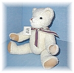 Large and lovely is this White Ted D. Bear made especially for Dept 56. He has curly white wool like fabric, and is 15 inches tall. He has his original paper label, and his cloth rear tag. His arms an...