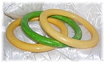 2 gold Bakelite bangles and 1 green one all pass the simichrome test with flying colors. T just over 1/4 inch wide each inner diameter 2 5/8 inches. 