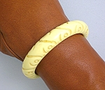 Carved Cream Bakelite Bangle bracelet 1/2 inch wide inner diameter 2 1/2 inches. 