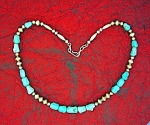 Native American Sterling Silver and Turquoise Beads Vintage necklace from the 1960s hook clasp 19 1/2 inches strung on chain with the Turquoise  just over 3/8 inch wide. 