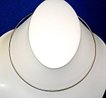 Sterling Silver Collar Necklace with a square box and hook  clasp. The silver is rounded and is just less than 1/8 of an inch. the necklace is marked 925.