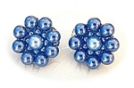 1 Inch Blue Faux Pearl Clip Earrings with a silvertone filigree back. They are stamped Japan on the backs of the clips. The fux pearls are in good shape with no peeling.