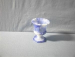 a lovely little urn shaped toothpick holder in blue on blue milk glass that is 3 1/8 inches tall, and 2 7/8 inches across. It is very pretty