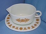 white milk glass gravy boat and underplate in the the popular Corelle Butterfly Gold pattern by Pyrex. Both pieces in excellent condition no chips cracks or wear to the paint.  Bowl- 5 inches wide 4 i...