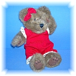 A very nice teddy bear by BOYDS bears and friends.  The bear comes with its original tags and is named Alexandra style number 918435.  Alex lives in a smoke free home and stands 10 inches tall.  She i...