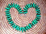 Fabulous and vey large 20 inch Turquoise Necklace with a Sterling Silver Toggle Clasp. The beads are an outstanding Bluey green color, and they are disc shaped. Each of the beads is 1 1/4 inches wide....