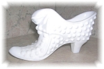 Fenton (unmarked) hobnail milk glass shoe. At top is cat with paws outstretched over tongue of shoe. This shoe measures about 6 inches by 3 inches. In great condition. 