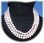 Fabulous and Very Luxurious 53 Inch Long handknotted Genuine Freshwater 8mm Pink Pearl Flapper Necklace. The pearls can be worn looped for a double or triple 'Stunning' Effect.