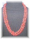 This stunning double strand red coral necklace measures 24 inches long.   Each bead is different. .  The color of the coral is quite unusual in that it is more red than orange.  I have worn this neckl...