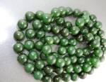 Jade Dark Green 10.2mm Hand knotted Beads 34 inches. No clasp they slip over the head.