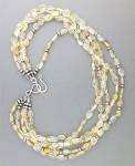 Citrine Gemstone Bead Necklace 17 Inch Inches end to end 4 Strands with Sterling Silver Spacer Beads and a Large Sterling Silver Hook Clasp. The beads are Pale Golden Yellow.