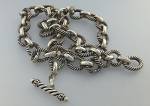 Sterling Silver rnate Link Necklace with a Toggle Clasp. The Necklace is 18 inces long end to end and has a large Toggle Clasp and it is 50 grams.