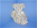 12 Inch Soft and Adorable Russ Berrie Teddy Bear. He is wearing a cram ribbon around his neck, and he has a hand stitched nose. His tummy is pettet filled, and so are his feet tips. He is in great con...
