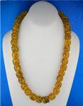Golden Yellow  Amber Beads 25 inches with a twist clasp with dark flecks inside all the the beads each bead is 1/2 inches.