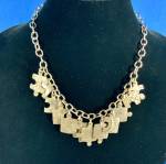 Sandcast Sterling Silver Puzzle Necklace By Artist Cynthia Beller Treasures Of The Ozarks 18 1/2 Inches approx 1.5/8 inch puzzle pieces 74 Grams