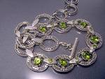 Designer Peggy V  Sterling Silver Toggle Clasp 7..2.8 ct and 6 .25 ct Peridot's 17 3/4 inches with a large toggle clasp 100 grams. 