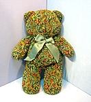 Hand Made large Inch Fabric Teddy  bear who lives in a smoke free home and is 18 inches tall.  It has a ribbon around the neck and no eyes. 