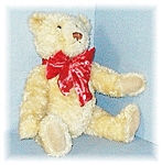 This lovely Teddy is not jointed and his label is 2002 Bialasky. He is 17 1/2 inches tall, and he has a Red Velvet Bow around his neck. His nose is hand stitches, and his paws and hands are suede leat...