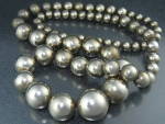 Silver Plate Navajo Pearls Graduated Beads Necklace 28 inches long 20mm center bead to 7mm.
